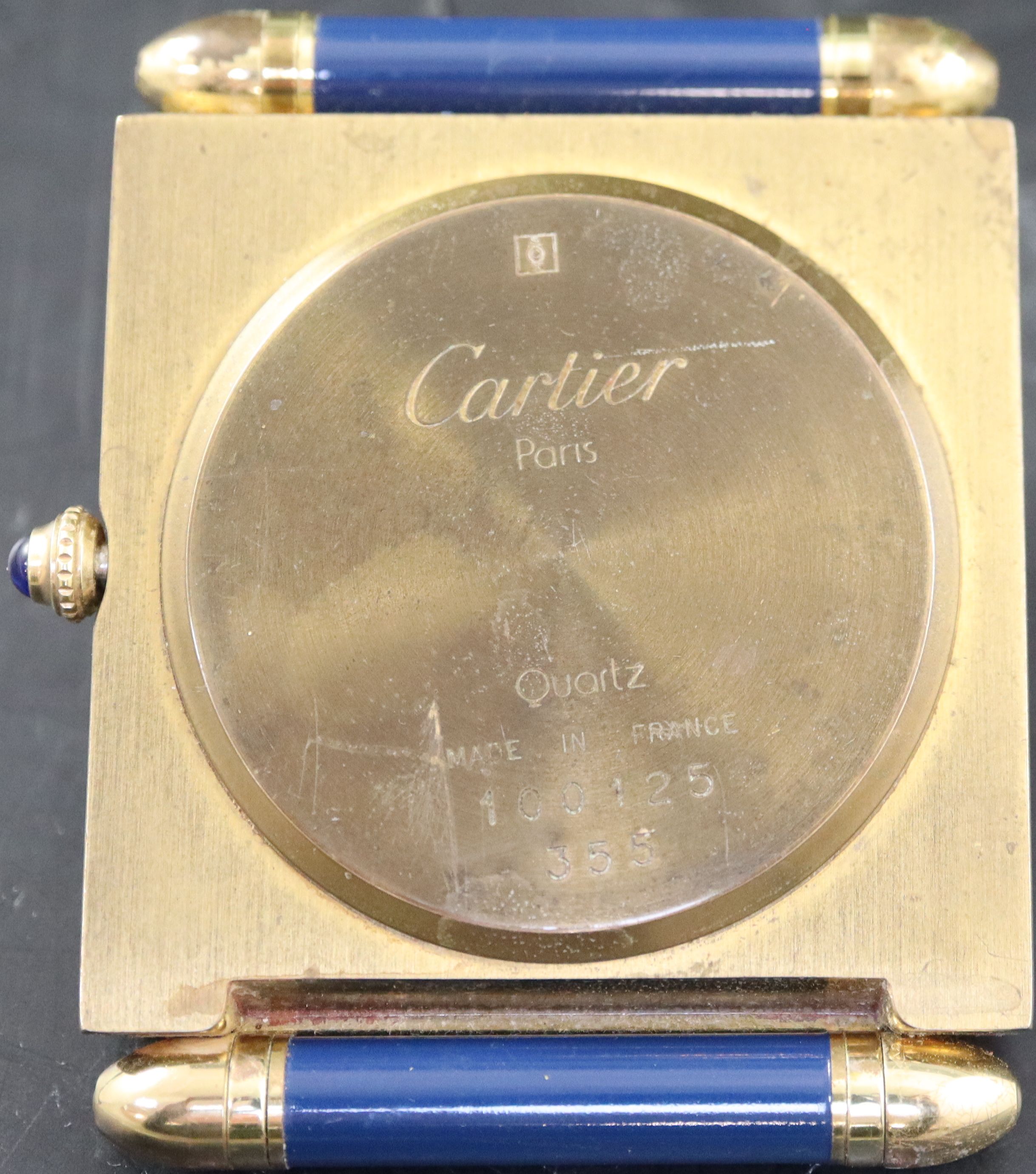 A late 20th century Cartier of Paris blue enamel and gilt brass quartz travelling timepiece, width 5cm height 6.25cm